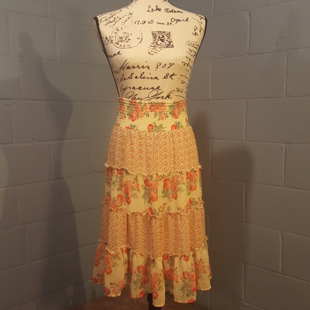 Little girls flowing flower pull on skirt.